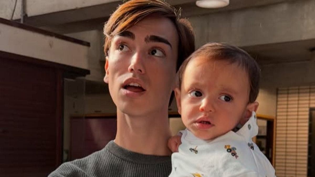 Dudu, ou o tio do bebê, com o bebê