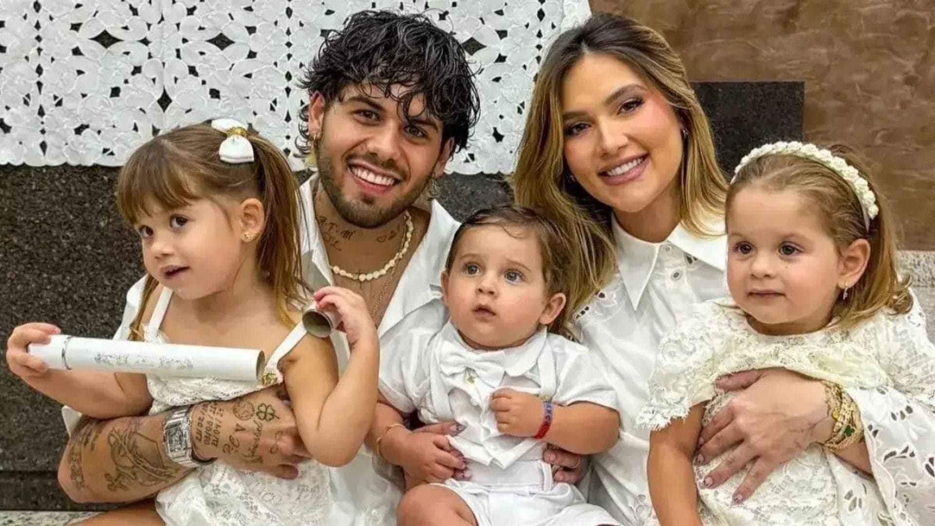 Zé Felipe e Virgínia no batizado de José Leonardo, o caçula